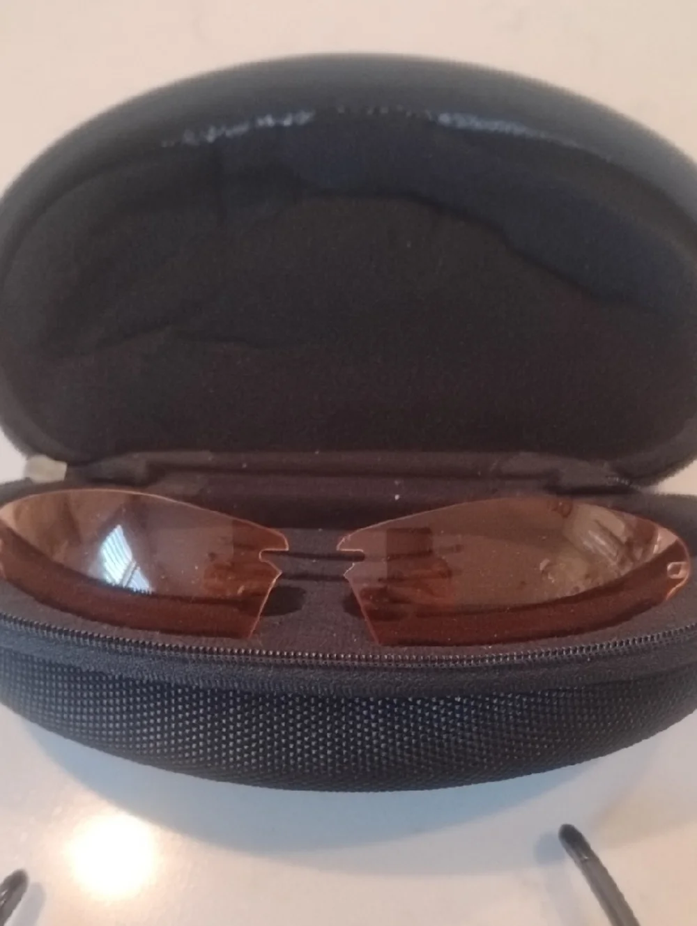 Oakley Black Frame Sunglasses with Gray And Orange Lenses